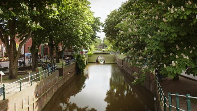 Idyllic Harbor of Greetsiel, a small picturesque fishing town and tourist attraction in North Frisia shortly before summer season starts. 