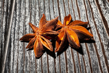 star anise on wood background