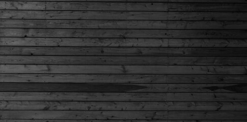 black floorboards with visible texture. background or texture