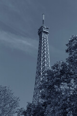 Eiffel Tower in Paris at summer colored in blue