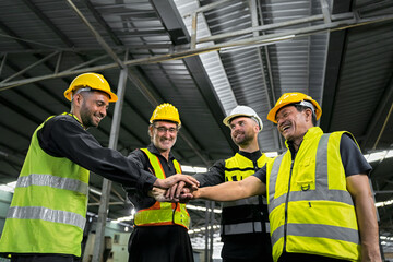 Engineers and technicians and workers, working together as a team, are joining forces to work on a...