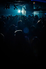 Dancing Underneath the Shadows: An Energetic Nightclub Experience
