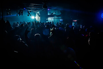 Dancing Underneath the Shadows: An Energetic Nightclub Experience