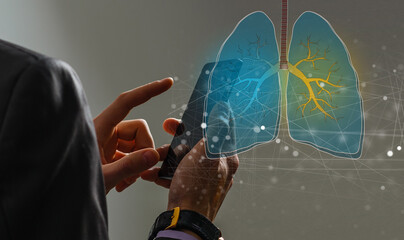 Close up of female doctor holding tablet with abstract glowing lung interface with virus outline on dark background. Medicine, pandemic and healthcare concept. Double exposure