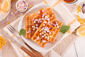 Waffles with jam and confetti. - 611723926
