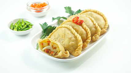 Fried pastels, in Indonesia known as Pastel goreng