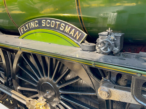 Cardiff, Wales - June 2023: Close up view of the name plate on The Flying Scotsman steam engine