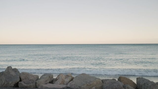 Slow motion side view of Antibes beach
