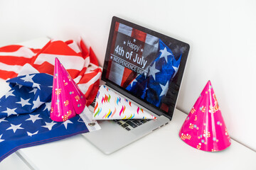 4th of July American Independence Day USA flags decorations with computer