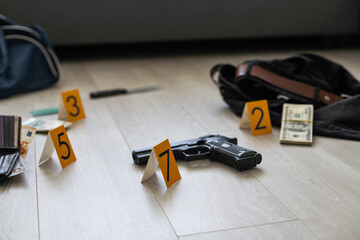 High contrast image of a crime scene with evidence markers