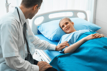 Doctor in professional uniform examining patient at hospital or medical clinic. Health care ,...