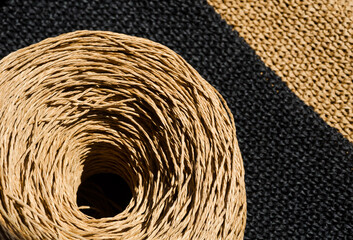Raffia is an organic wood fiber, cellulose is a natural polymer.