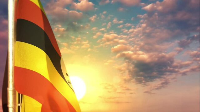 Uganda waving flag on pretty sundown bg