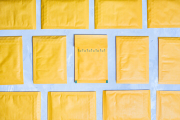 Yellow Padded Envelopes Neatly Arranged on Table