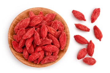 Dried goji berries in wooden bowl isolated on white background. Top view. Flat lay.