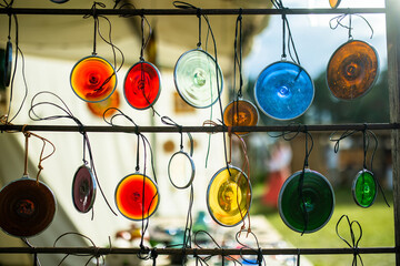 Colorful handmade glass pendants sold on a fair in Vilnius.