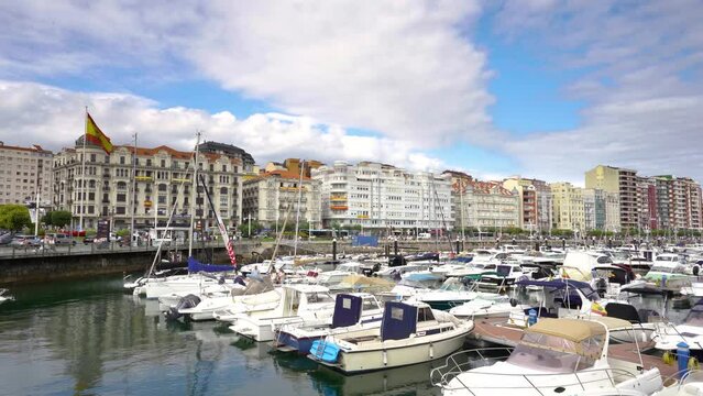 Santander, SPAIN - August 21 2022: Beautiful port of Santander. Boats docked. Travel destination in North of Spain. Panoramic view of marina and part of the city center. Stabilized static video