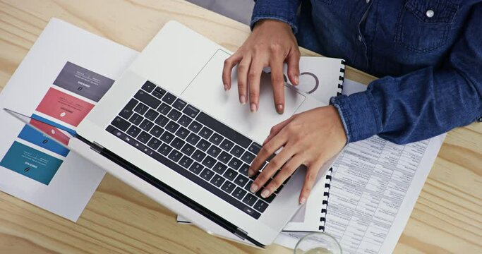 Hands, journalist or person typing on laptop working on research project or article on keyboard in office. Above, online business paperwork or journalist writing blog report, documents or articles