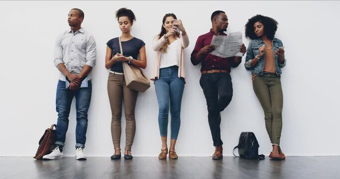 Waiting room, recruitment and business people standing in line for job interview at an office. Hiring, queue and person group of employees prepare for meeting or recruiting process on wall background