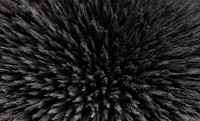 Iron filings spikes. Reaction of iron dust to a magnetic field. Visualisation. Texture, of magnetic particles.
