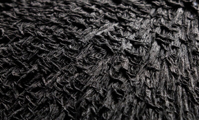 Iron filings texture. Visualisation of magnetic field. Top view, close up. Pattern of magnetic particles.