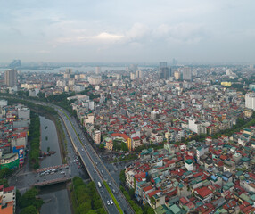 Aerial view of residential neighborhood roofs. Urban housing development from above. Top view. Real estate in Hanoi City, Vietnam. Property real estate.