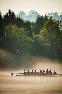 Female rowers in the fog on Melton Hill Lake during the Secret City Head Race in Oak Ridge, Tennessee