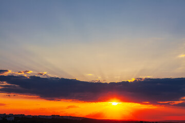 Sunset on horizon over the city . Beautiful twilight in the city 