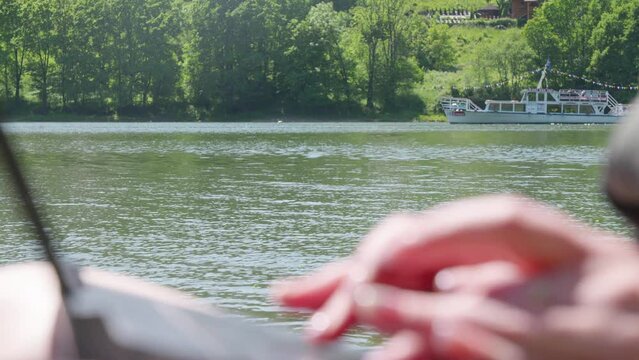 Girl On The Lake With A Laptop Working Outdoors