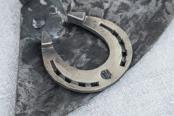 Metal handmade horseshoe with natioanl Ukrainian emblem imprint.