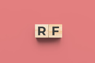 RF (Rheumatic Fever) wooden cubes on red background