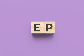 EP (Epilepsy) wooden cubes on purple background