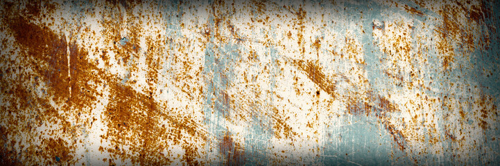 Old rusty metal texture. Rust on the surface of the iron wall. Panoramic background for grunge design.