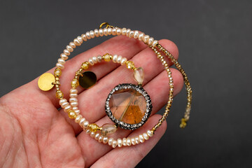 Unique gemstone necklace, handmade jewelry concept, promotional photo for an online jewelry store	
