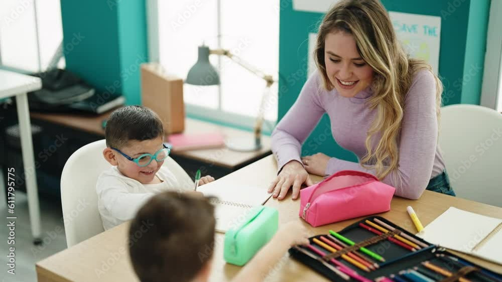 Poster Woman and boys having lesson sitting on table at classroom