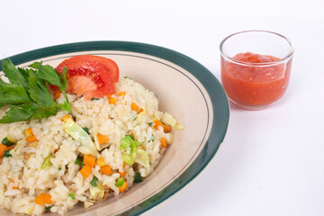 fried rice with sauce in small container isolated on white background