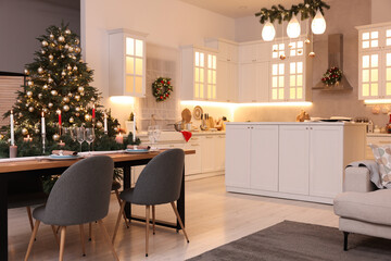 Cozy spacious kitchen decorated for Christmas. Interior design