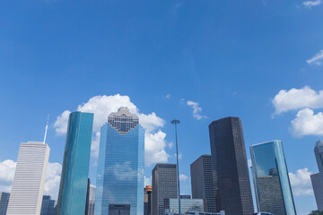 Fototapeta na wymiar photo of the Houston downtown skyline with clouds in the background.