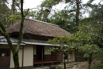 Fototapeta na wymiar Traditional Japanese Garden at Ritsurin Garden Park in Takamatsu, Kagawa, Japan - 日本 香川 高松 栗林公園 日本庭園