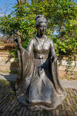 Bronze statues of ancient Chinese female figures in the park