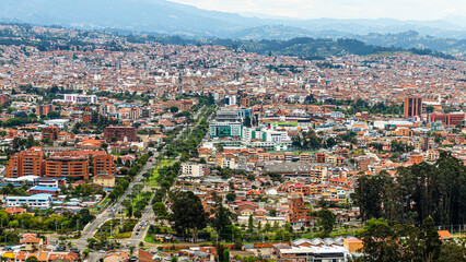 Panoramic top view of the city of Cuenca, located in the valley, from the observation deck of Turi, Ecuador