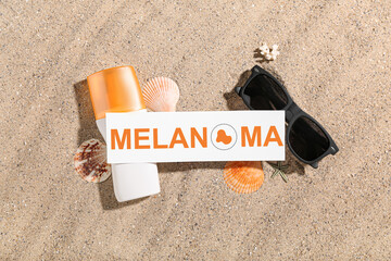 Banner with beach sunglasses, sunscreen and word MELANOMA