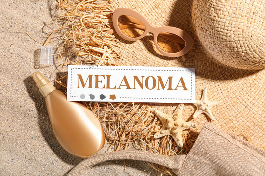 Banner with beach accessories and word MELANOMA - Powered by Adobe