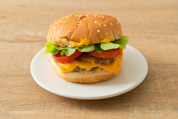 pork burger with cheese on plate