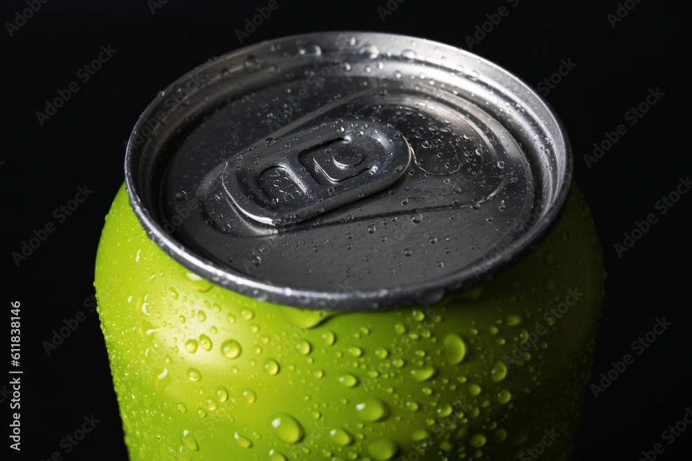 Wall mural Green can of fresh soda with water drops on dark background, closeup