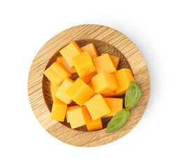 Wooden bowl with cubes of tasty cheddar cheese on white background