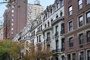 Manhattan residential street near Central Park, with mix of townhouses and apartment buildings