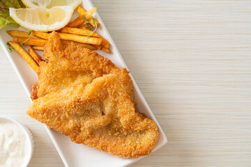 fish and chips - fried fish fillet with potatoes chips - obrazy, fototapety, plakaty