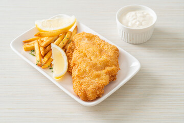 fish and chips - fried fish fillet with potatoes chips