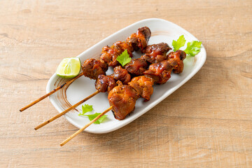 grilled chicken gizzard skewer with herbs and spices